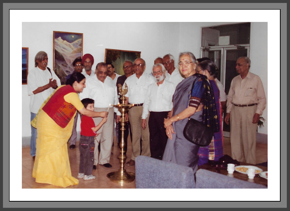 Chaitanya Kaul lighting the lamp at his grandfather’s exhibition