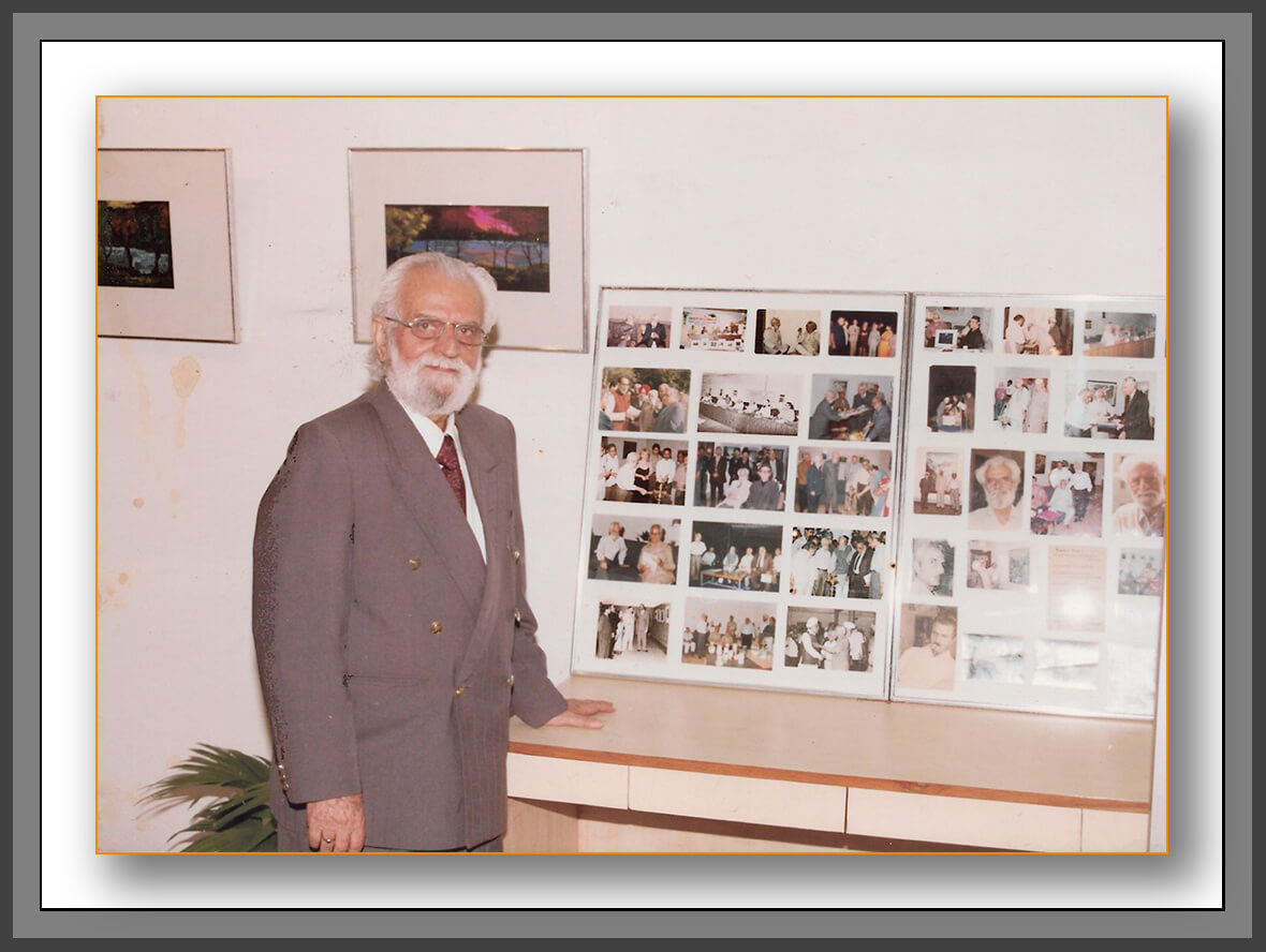 Manohar Kaul with a collage of his photographs